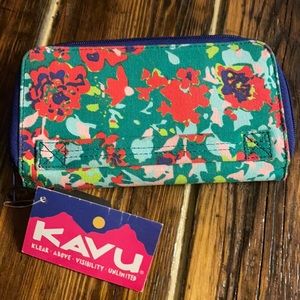 Brand new, never used Kavu wallet.  Fun, bright floral pattern.  Great wallet.
